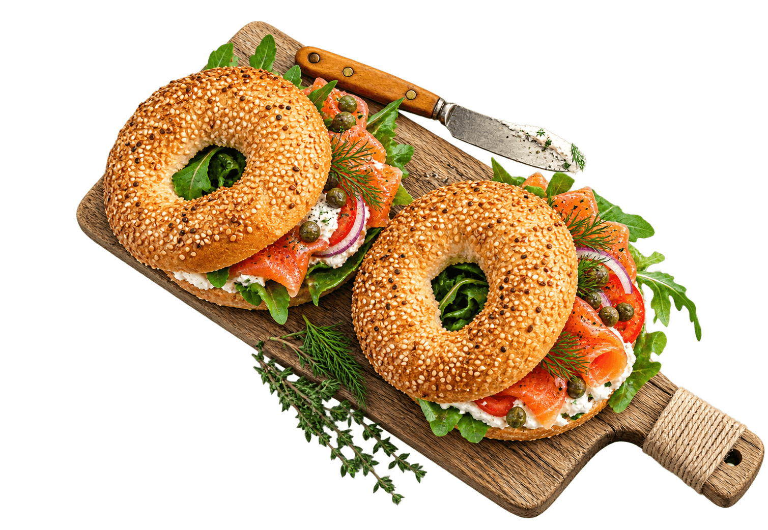 Sesame bagel sandwiches on a wooden board